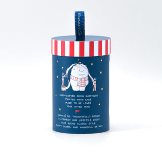 Holiday ornament tin with red-and-white stripes and blue band, cute animal illustration and text